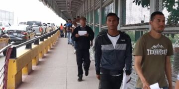 migrantes con CBP One