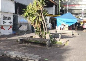 hombre en situación de calle sin vida