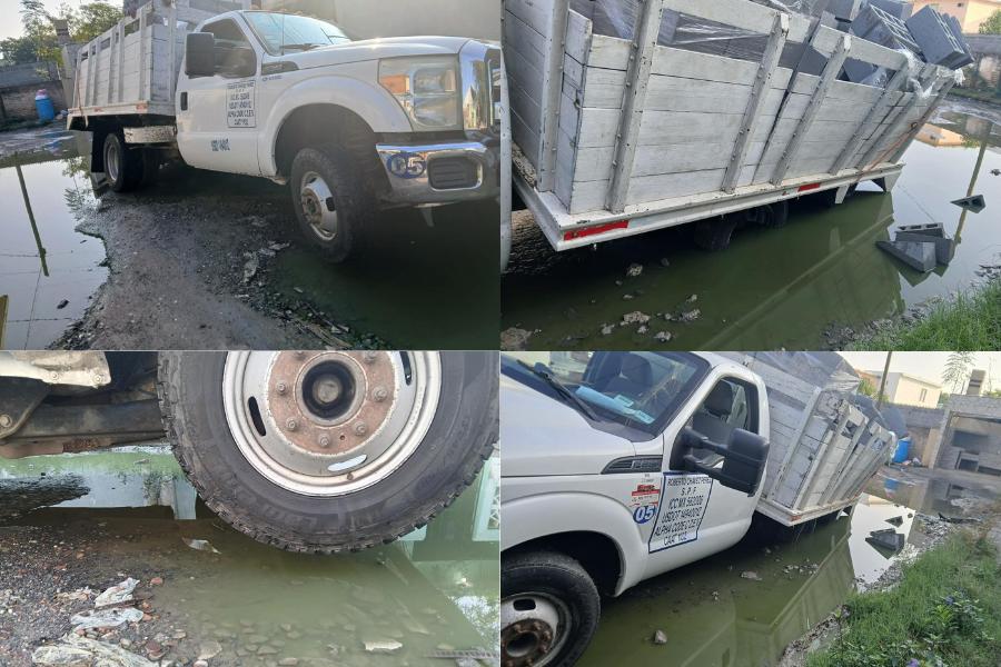 Camión de materiales cae en bache de la colonia Buenavista, Matamoros, Tamaulipas