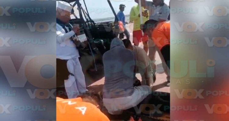 pescador escollera de Miramar