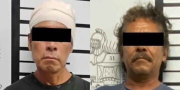 hombres machete palo Santiago