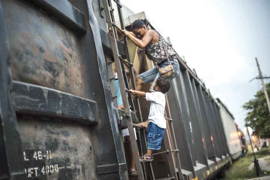 niñas niños migrantes Arquidiocesis